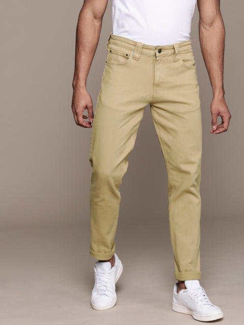 

Calvin Klein Jeans Men Khaki Slim Fit Mid-Rise Clean Look Stretchable Jeans