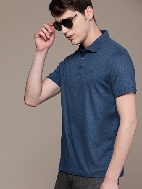 

Calvin Klein Jeans Men Blue Solid Polo Collar T-shirt