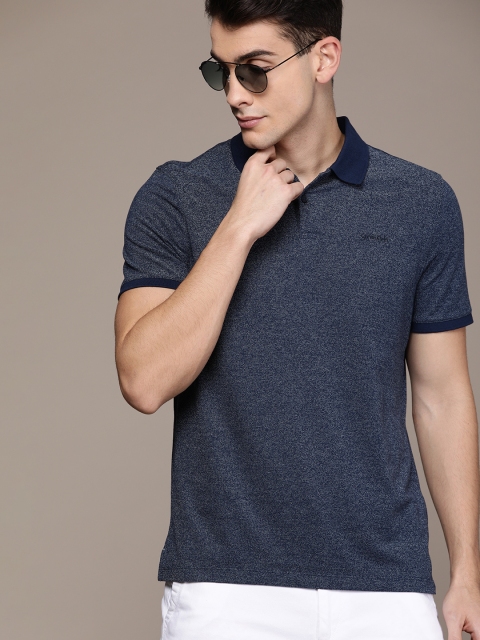 

Calvin Klein Jeans Men Navy Blue Solid Polo Collar T-shirt