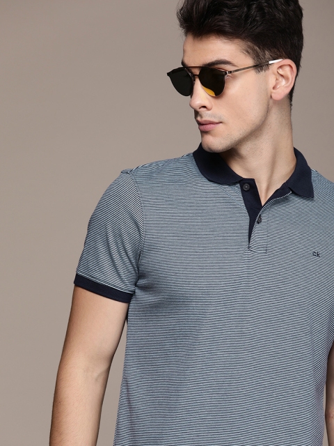 

Calvin Klein Jeans Men Navy Blue Striped Polo Collar Pure Cotton T-shirt