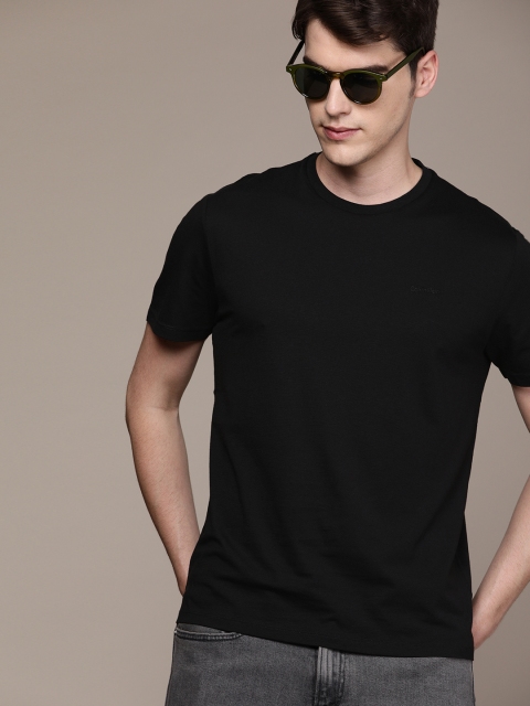 

Calvin Klein Jeans Men Black Solid Round Neck T-shirt