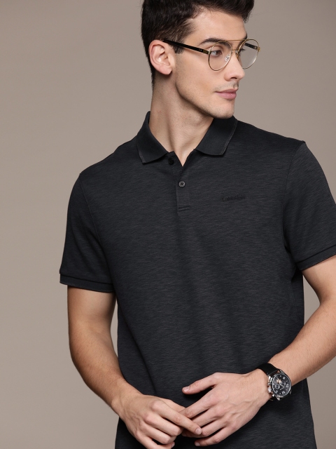 

Calvin Klein Jeans Men Navy Blue Solid Polo Collar T-shirt