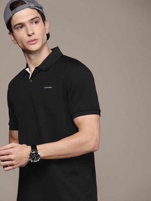 

Calvin Klein Jeans Men Black Self Design Polo Collar T-shirt