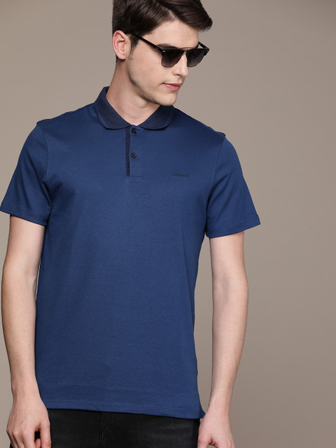 

Calvin Klein Jeans Men Navy Blue Solid Polo Collar T-shirt