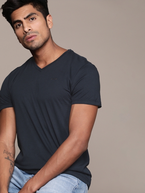 

Calvin Klein Jeans Men Navy Blue Solid V-Neck T-shirt