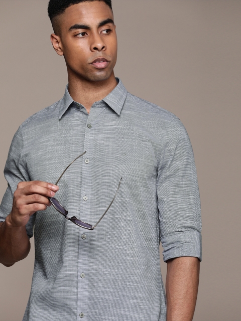 

Calvin Klein Jeans Men Blue Solid Slim Fit Casual Shirt