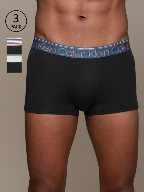 

Calvin Klein Underwear Men Pack of 3 Solid Trunks NB2336BFR, Black