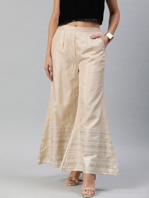 

Inddus Women Beige & Silver-Toned Foil Printed Wide Leg Palazzos