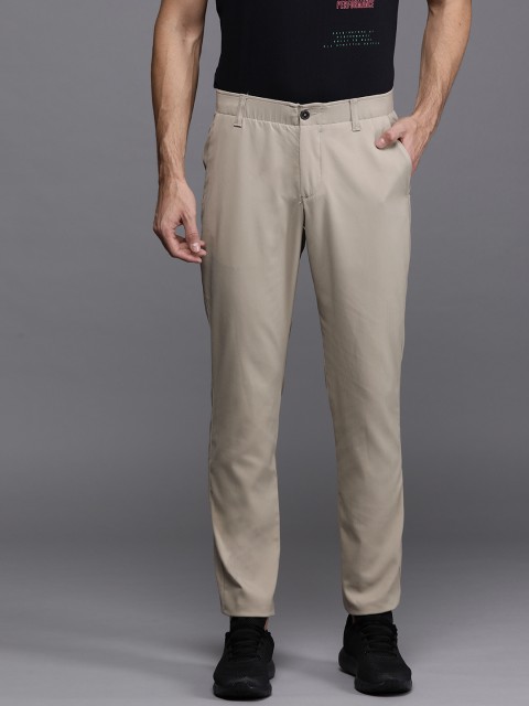 

UNDER ARMOUR Men Beige Showdown Tapered Fit Golf Solid Trousers