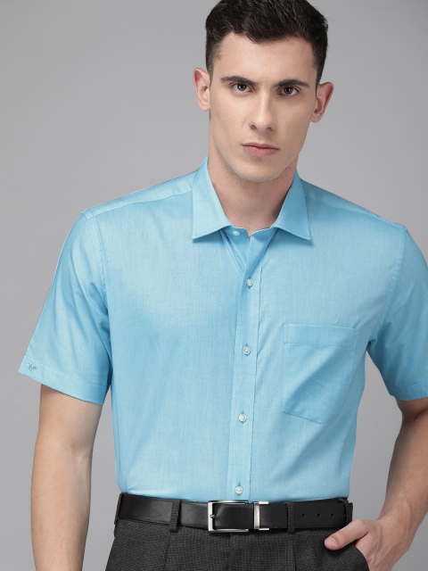 

Park Avenue Men Turquoise Blue Regular Fit Solid Formal Shirt