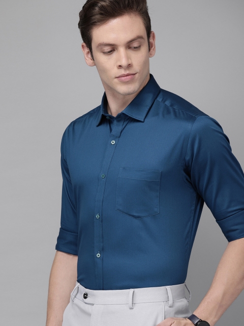 

Park Avenue Men Teal Blue Super Slim Fit Solid Party Shirt