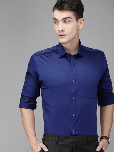 

Park Avenue Men Blue Slim Fit Solid Party Shirt