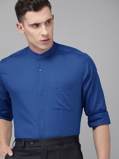 

Park Avenue Men Blue Regular Fit Solid Smart Casual Shirt