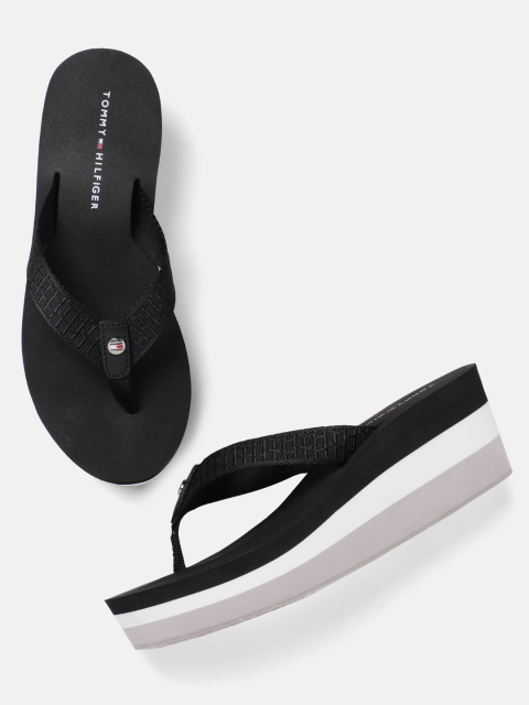 

Tommy Hilfiger Women Black Solid Heeled Flip-Flops