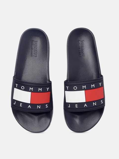

Tommy Hilfiger Women Navy Blue & Red Colourblocked Sliders