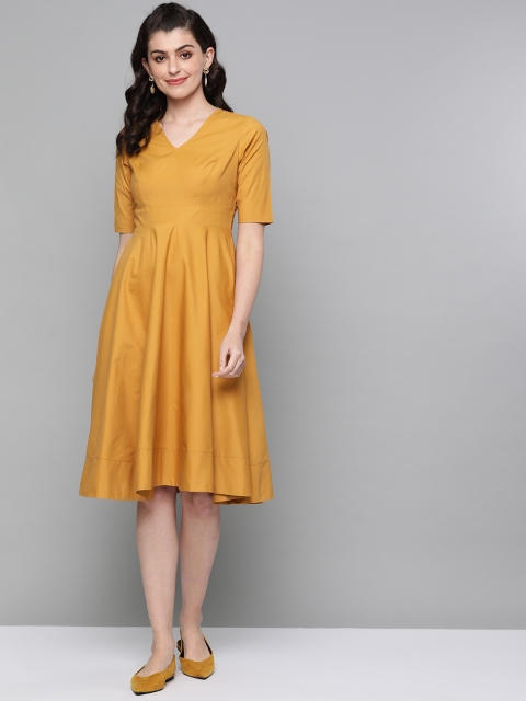 

Femella Women Mustard Yellow Solid Fit and Flare Dress