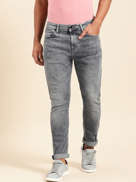 

United Colors of Benetton Men Blue Carrot Regular Fit Mildly Distressed Stretchable Jeans