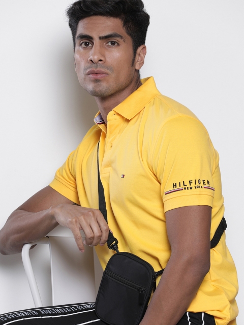 

Tommy Hilfiger Men Yellow Solid Polo Collar T-shirt