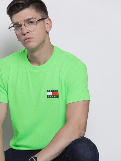 

Tommy Hilfiger Men Fluorescent Green Solid Round Neck T-shirt with Applique Detail