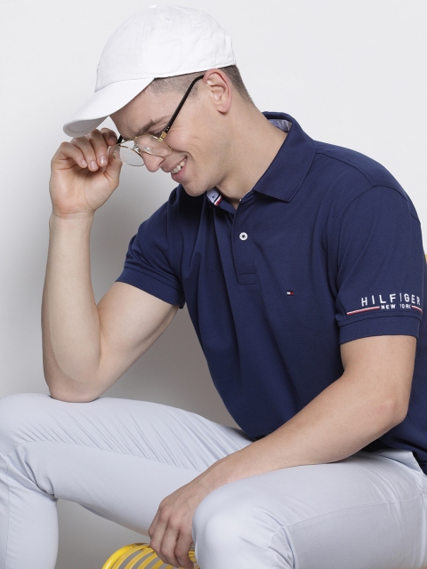 

Tommy Hilfiger Men Navy Blue Solid Polo Collar T-shirt