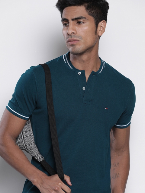 

Tommy Hilfiger Men Teal Blue Solid Polo Collar Pure Cotton T-shirt