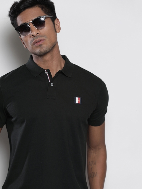 

Tommy Hilfiger Men Black Solid Polo Collar Pure Cotton T-shirt With Applique Detail