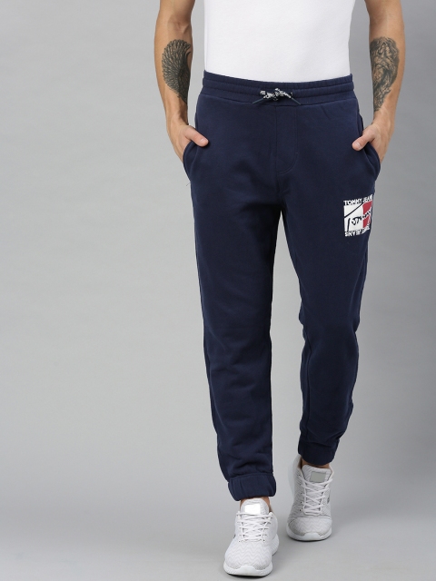 

Tommy Hilfiger Men Navy Blue Solid Slim Fit Joggers with Printed Detail