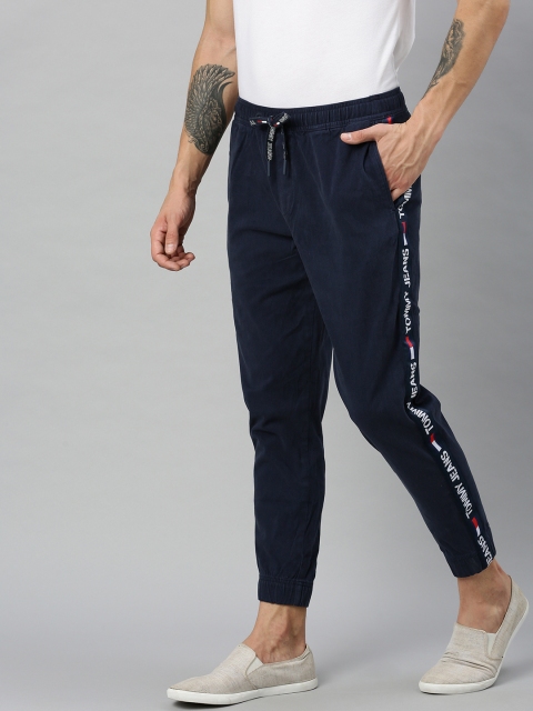 

Tommy Hilfiger Men Navy Blue Regular Fit Solid Joggers With Side Stripe