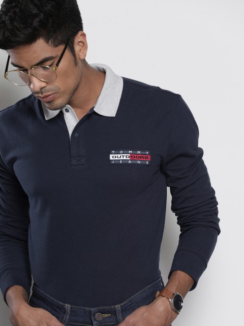 

Tommy Hilfiger Men Navy Blue Solid Polo Collar T-shirt with Applique Detailing