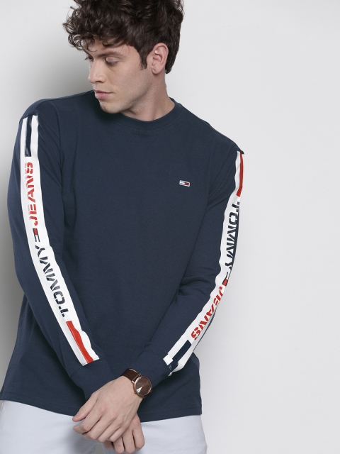 

Tommy Hilfiger Men Navy Blue Solid Round Neck T-shirt With Printed Detailing