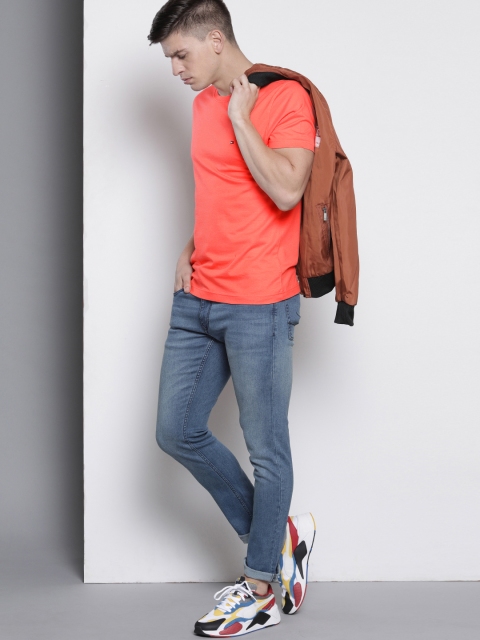 

Tommy Hilfiger Men Coral Orange Solid Round Neck T-shirt