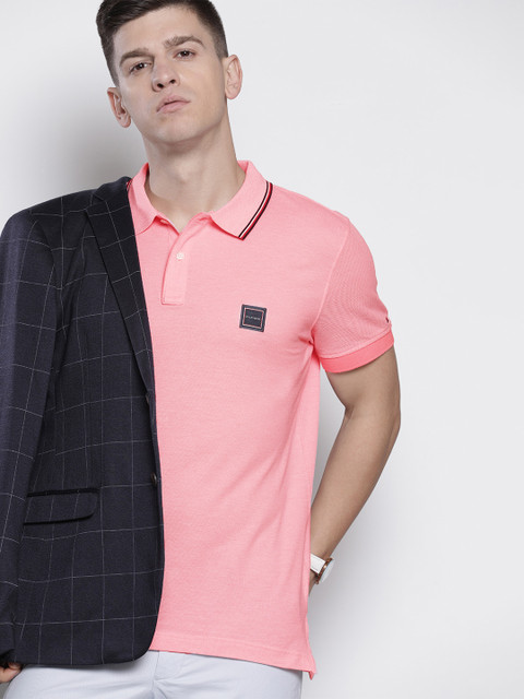 

Tommy Hilfiger Men Pink Solid Polo Collar Pure Cotton T-shirt