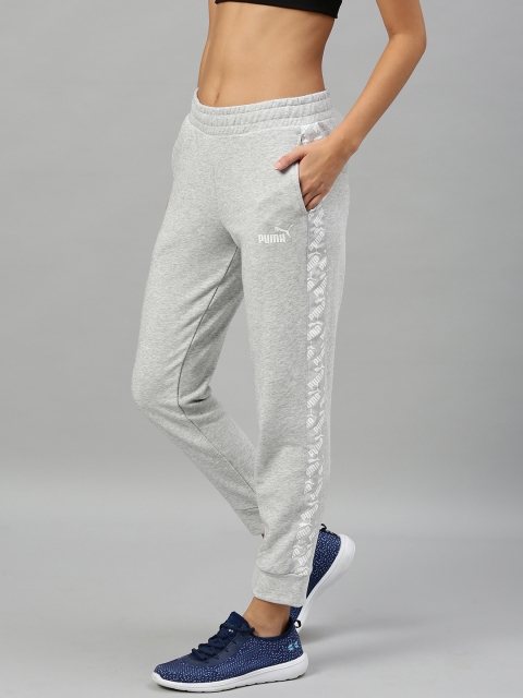 

Puma Women Grey Melange Straight Fit Amplified TR cl Solid Joggers with Printed Detail