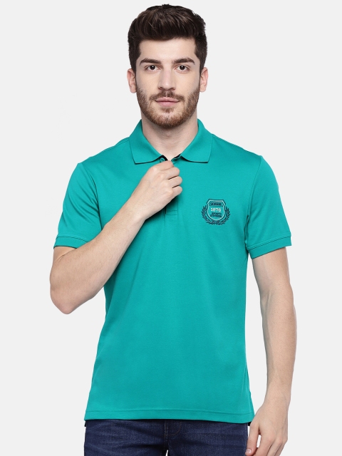 

Jockey Men Teal Blue Solid Polo Collar T-shirt
