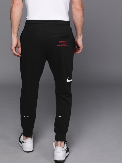 

Nike Men Black Solid Straight Fit SWOOSH Joggers With Embroidered Detailing