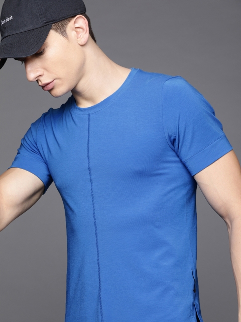 

Nike Men Blue dri-Fit Technology Solid Round Neck Yoga & Training T-shirt