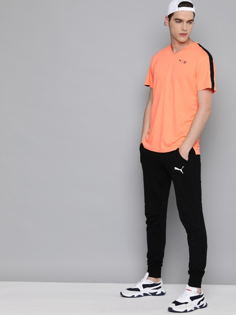 

Puma Men Orange Self Design First Mile SS Dry Cell V-Neck Running T-shirt