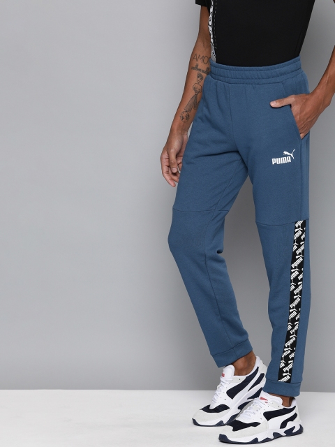 

Puma Men Navy Blue Straight Fit Solid AMPLIFIED Joggers with Side Stripes