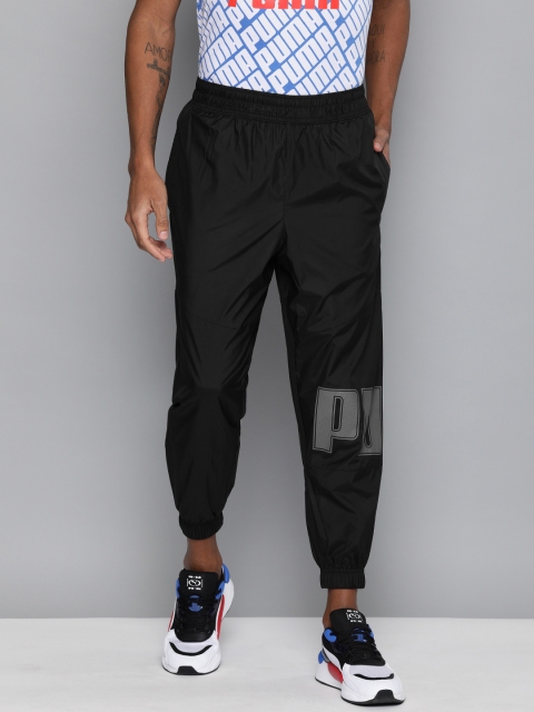 

Puma Men Black Solid Collective Woven WINDCELL Joggers