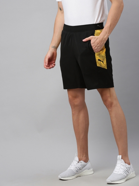 

Puma Men Black Solid ftblNXT Regular Fit Sports Shorts with Printed Detail