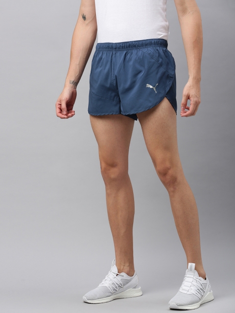 

Puma Men Blue Solid Regular Fit IGNITE Split dryCELL Sports Running Shorts
