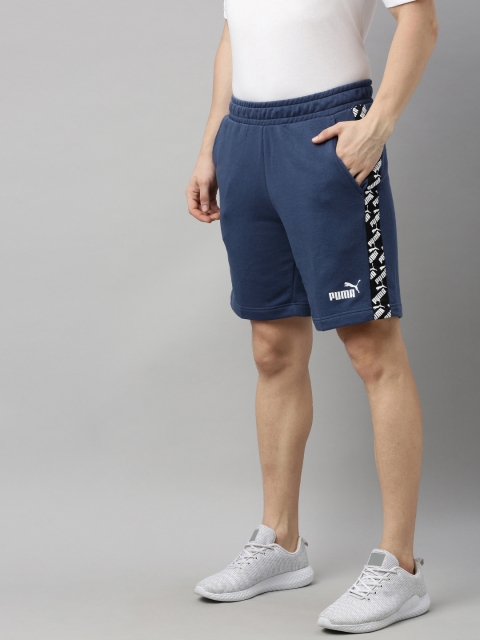 

Puma Men Blue Solid Regular Fit AMPLIFIED Sports Shorts