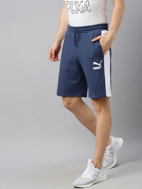 

Puma Men Blue Striped Regular Fit Regular Shorts