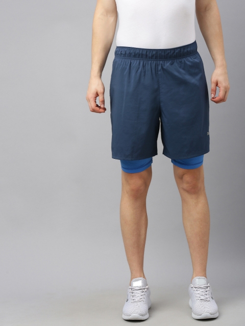

Puma Men Blue Solid Regular Fit Last Lap 2in1 dryCELL Sports Shorts