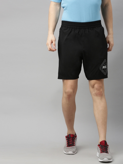 

Puma Men Black Solid Regular Fit Collective Woven Sports Shorts with Printed Detail