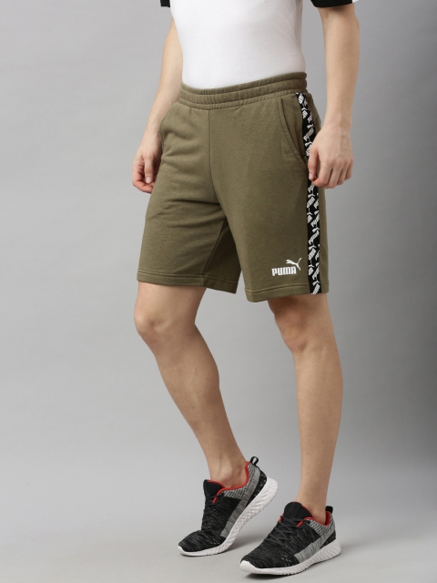 

Puma Men Olive Green Solid Regular Fit Regular Shorts