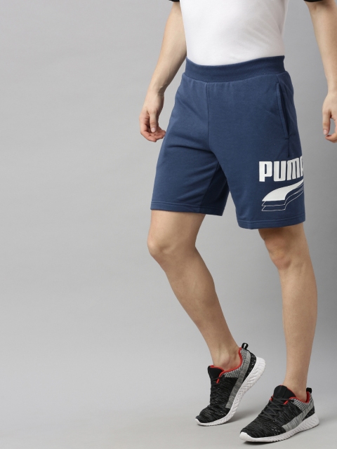 

Puma Men Blue Solid Regular Fit Regular dryCELL Shorts