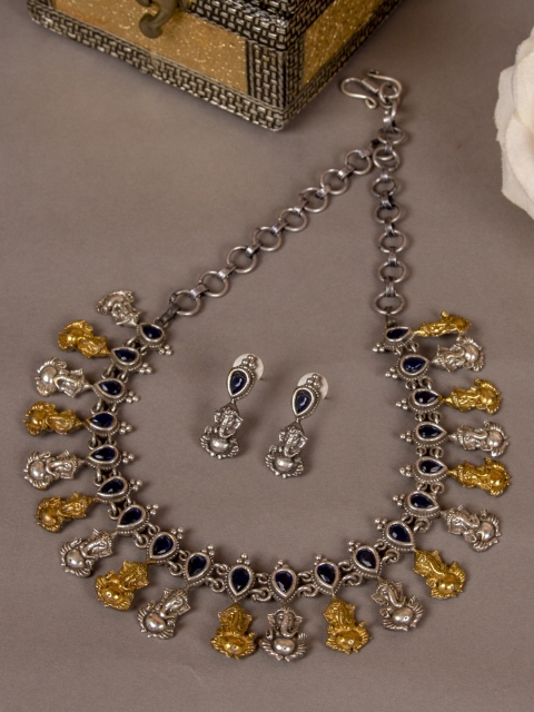 

AccessHer German Silver Dual Tone Ganesh Design Temple Jewellery Set