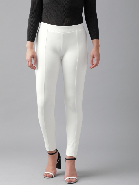 

Anaisa Women White Slim Fit Solid Treggings