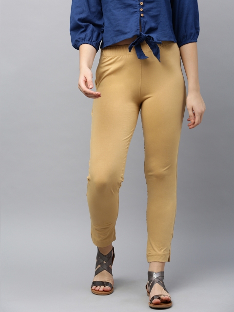 

LYRA Women Beige Solid Regular Trousers